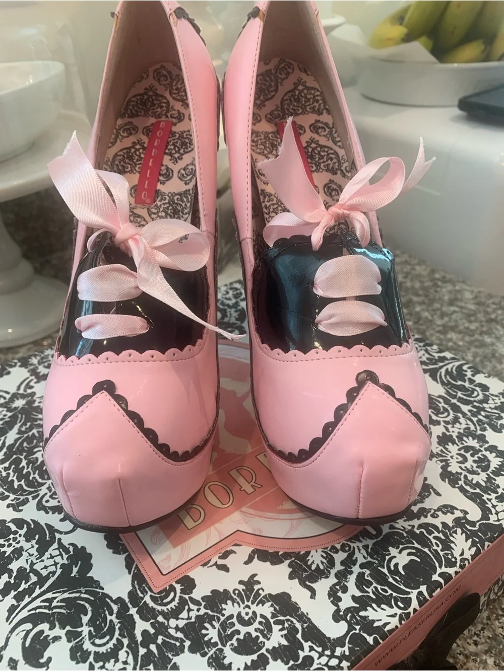 Bordello Pink Patent Platform Pumps with Black Trim and Ribbon